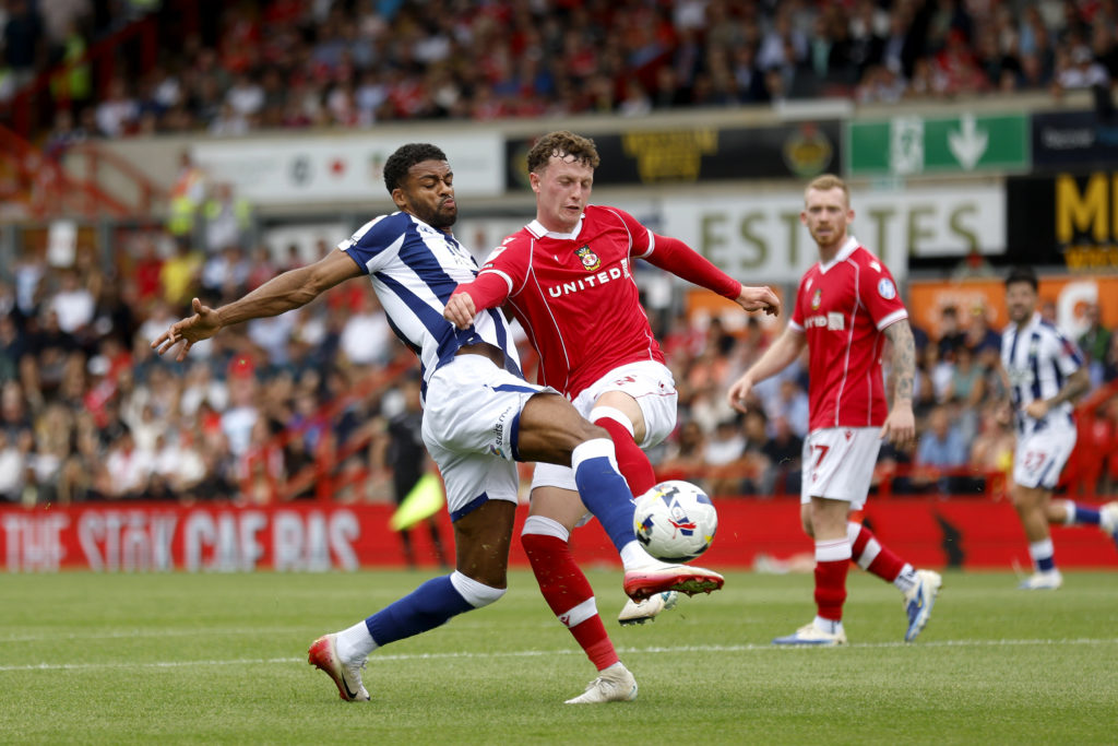 Darnell Furlong of West Bromwich Albion and Lewis Brunt of Wrexham AFC