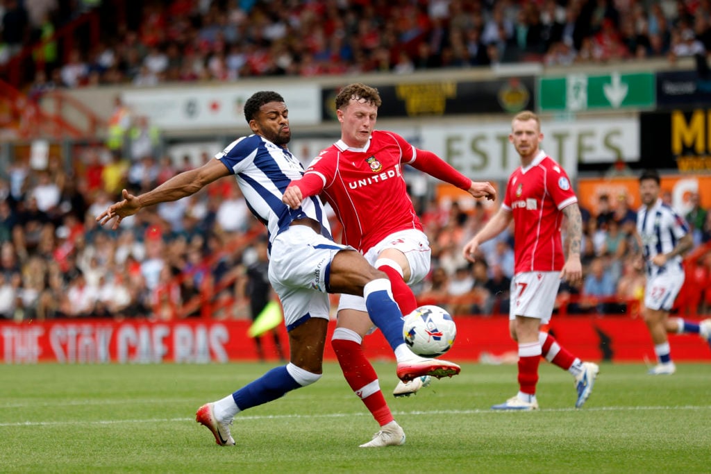 Darnell Furlong of West Bromwich Albion and Lewis Brunt of Wrexham AFC