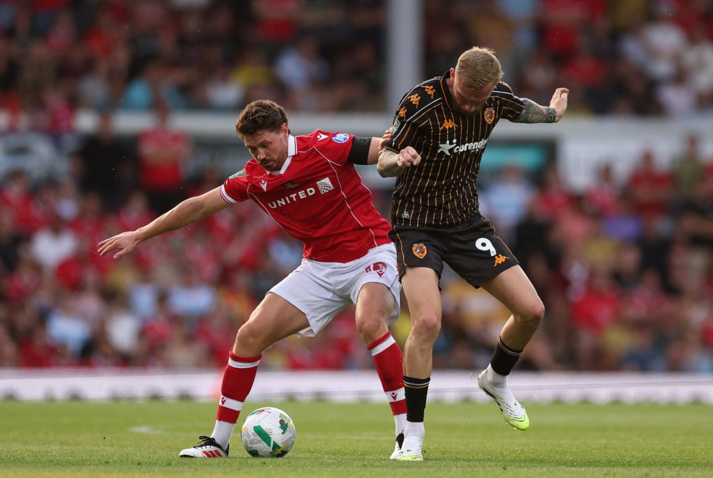 George Evans in action during Wrexham v Hull City in the Carabao Cup First Round clash.