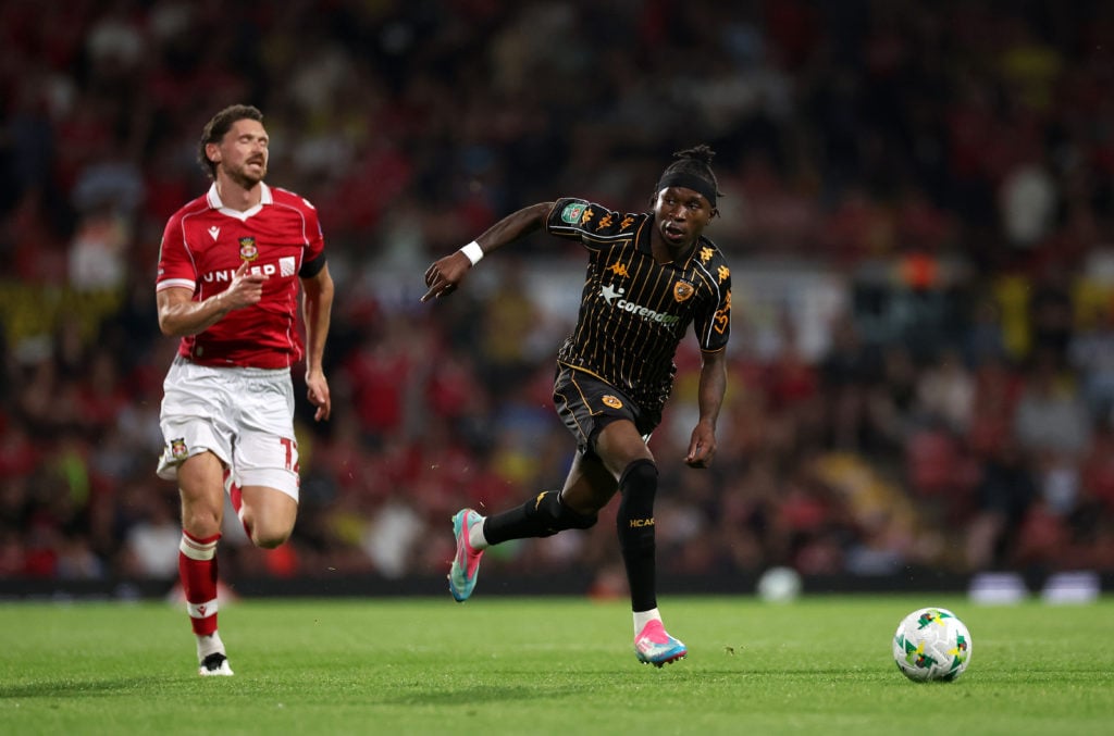 George Evans in action during Wrexham v Hull City in the Carabao Cup First Round clash.