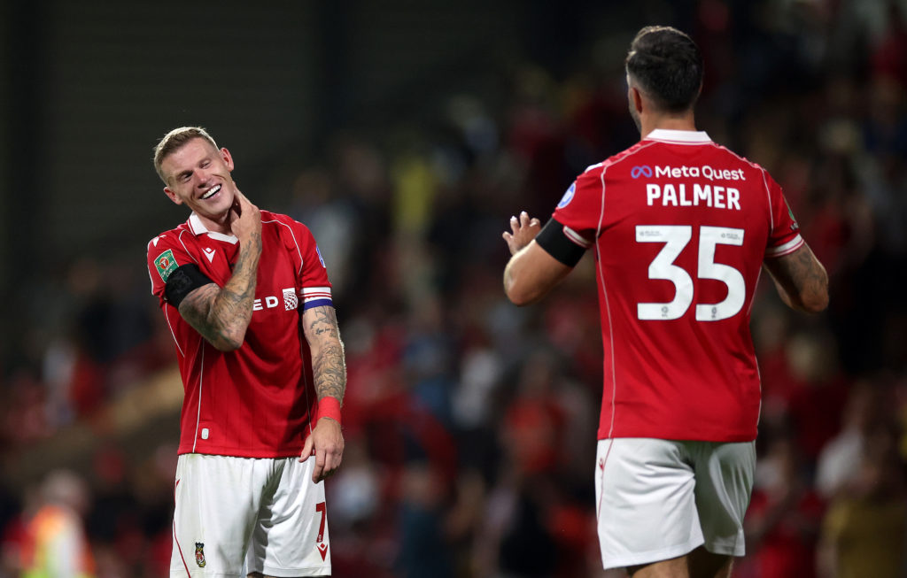 James McClean and Ollie Palmer celebrate for Wrexham against Hull City