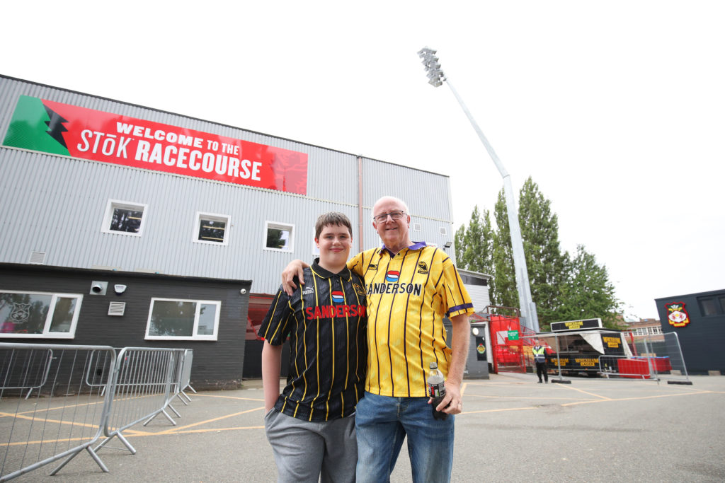 Sheffield Wednesday fans pose for a photo outside the stadium