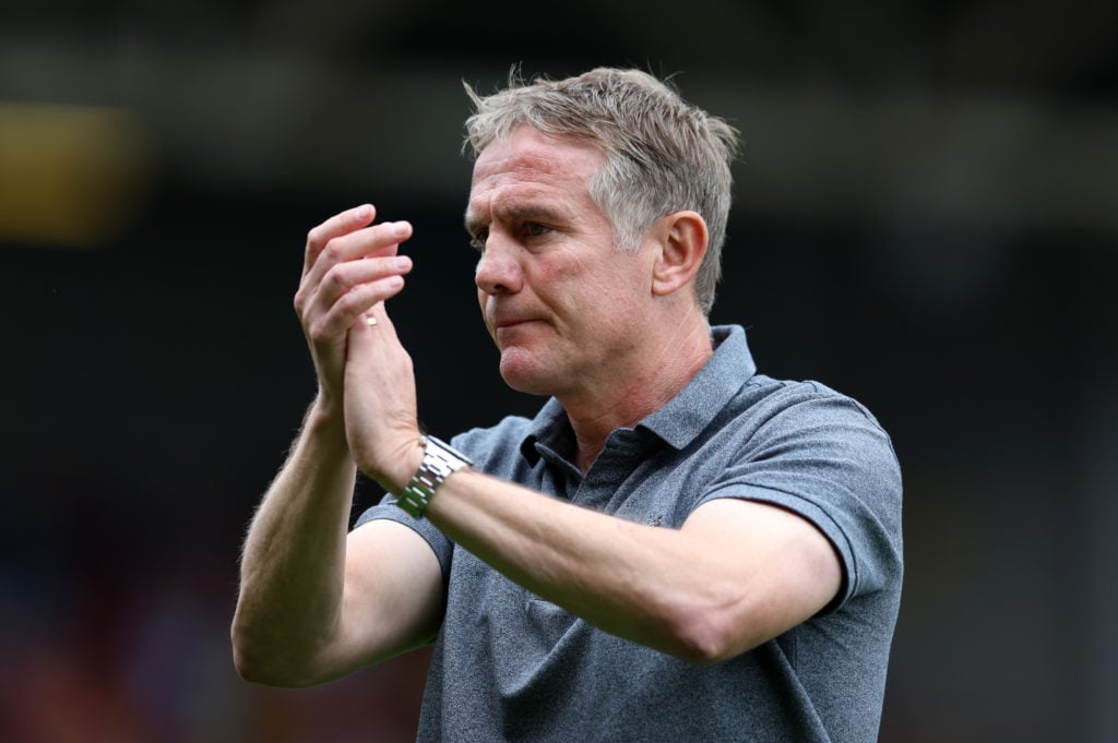 Phil Parkinson, Manager of Wrexham applauds fans