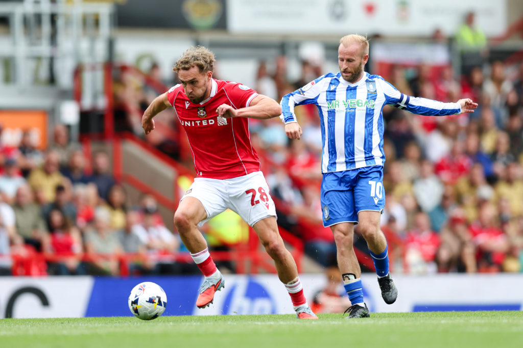 Sam Smith and Barry Bannan during Wrexham AFC v Sheffield Wednesday - Sky Bet Championship