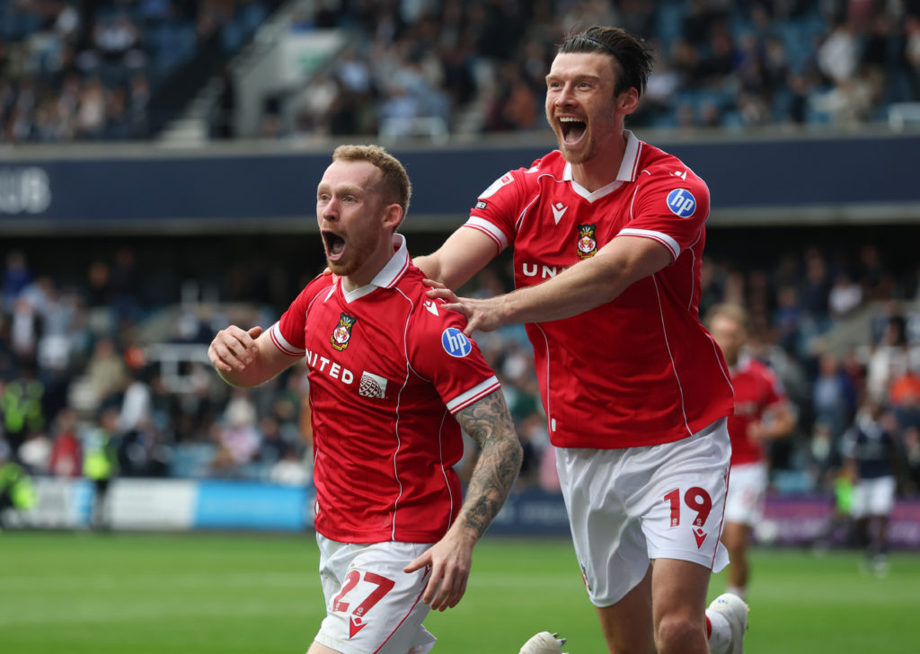 Lewis O'Brien of Wrexham celebrates his goal with Kieffer Moore of Wrexham