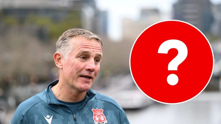Phil Parkinson, coach of Wrexham AFC speaks to the media, and mystery referee inset.