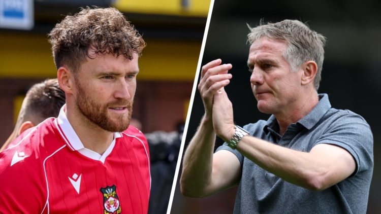 Dan Scarr of Wrexham AFC looks on (left), Phil Parkinson, Manager of Wrexham applauds (right)