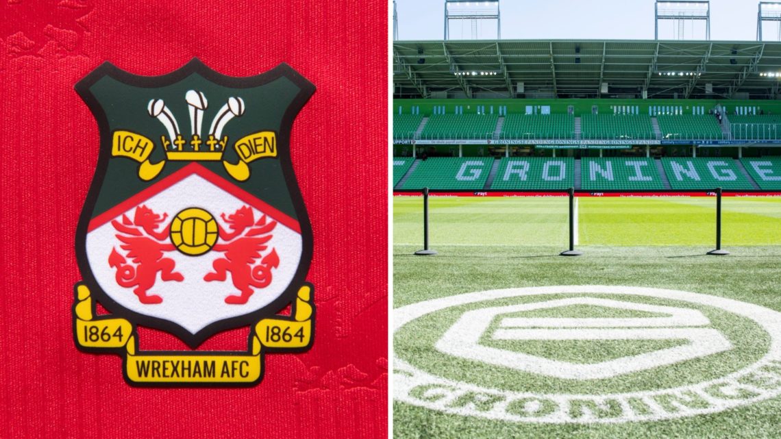 The official club badge of Wrexham AFC on a home shirt. A general view of FC Groningen's Euroborg stadium.
