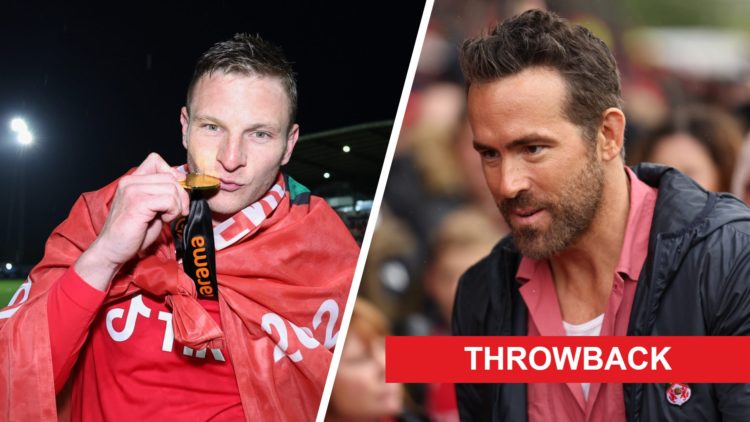 Paul Mullin of Wrexham kisses his champions winner medal. Ryan Reynolds the co-owner of Wrexham prior to the Sky Bet League Two match between Wrexh...
