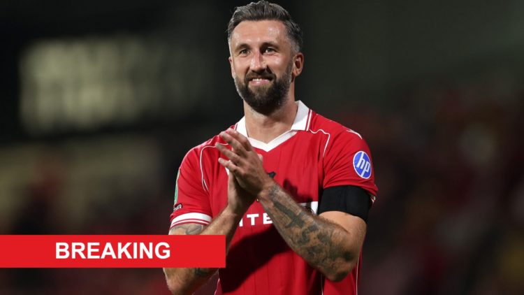 Ollie Palmer of Wrexham applauds the fans