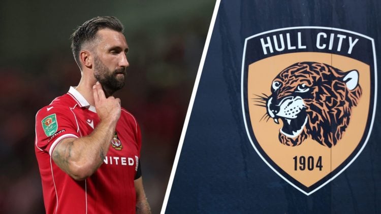 Ollie Palmer celebrates for Wrexham against Hull City. A general view of the Hull City badge.