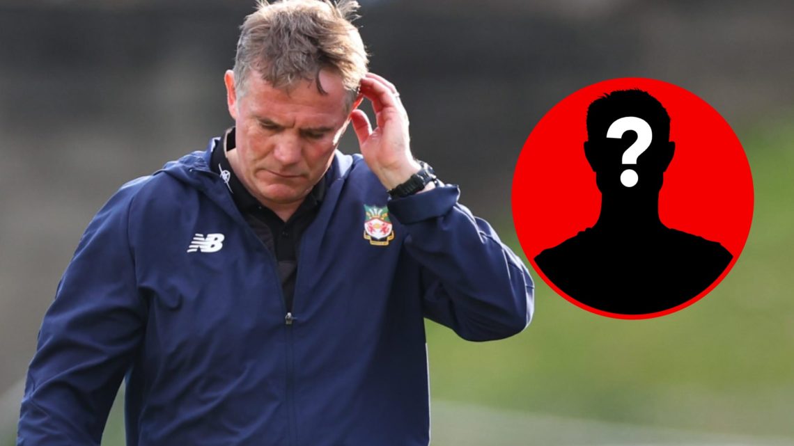 A dejected Phil Parkinson looks on for Wrexham