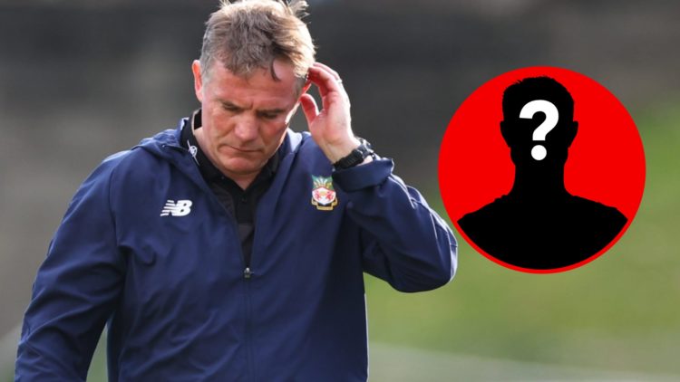 A dejected Phil Parkinson looks on for Wrexham