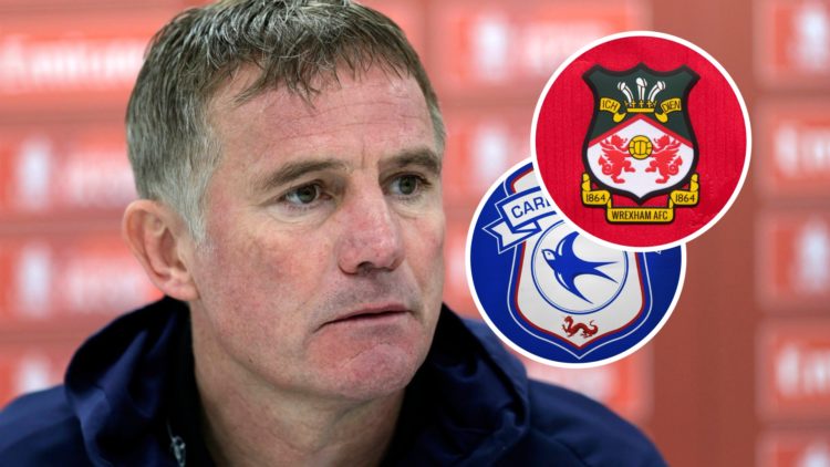 Phil Parkinson speaking to the media before Wrexham v Oldham Athletic: Emirates FA Cup First Round. Detailed view of a Cardiff City badge. The offi...