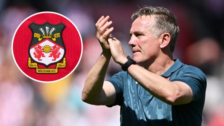 Phil Parkinson, Manager of Wrexham applauds the fans. The official club badge of Wrexham AFC on a home shirt.