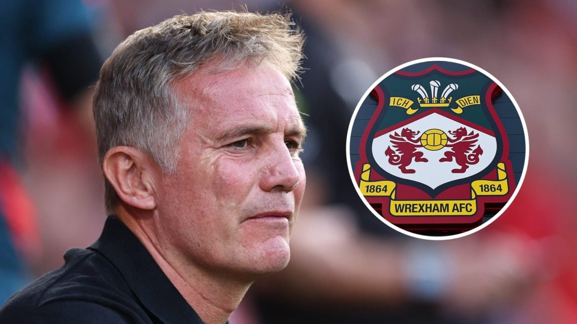 Wrexham manager Phil Parkinson looks on. Detailed view of a Wrexham club crest