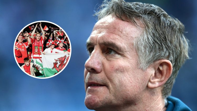 Wrexham manager Phil Parkinson looks on. Wrexham fans celebrate winning the LDV Vans Trophy
