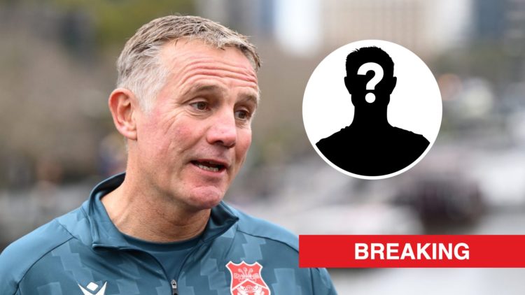 Wrexham boss Phil Parkinson looks on. Inset, a mystery player icon and red banner with 'breaking' in white text.