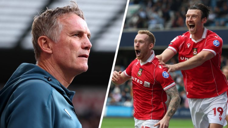 Phil Parkinson, Manager of Wrexham looks on (left), Lewis O'Brien of Wrexham celebrates his goal with Kieffer Moore of Wrexham (right)