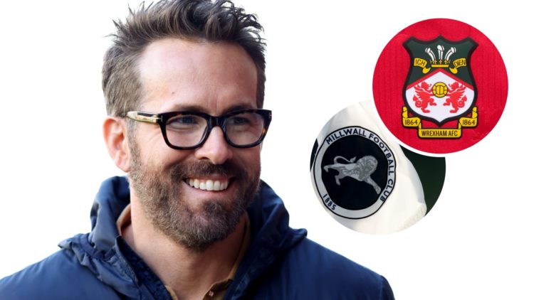 Wrexham co-owner Ryan Reynolds. The official club badge of Wrexham AFC on a home shirt. The Millwall club crest is seen on a corner flag.