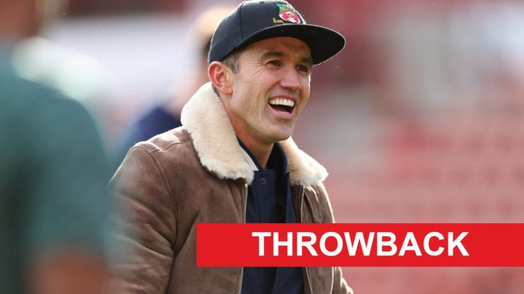 Rob McElhenney smiles before Wrexham's National League clash with Notts County in 2023.