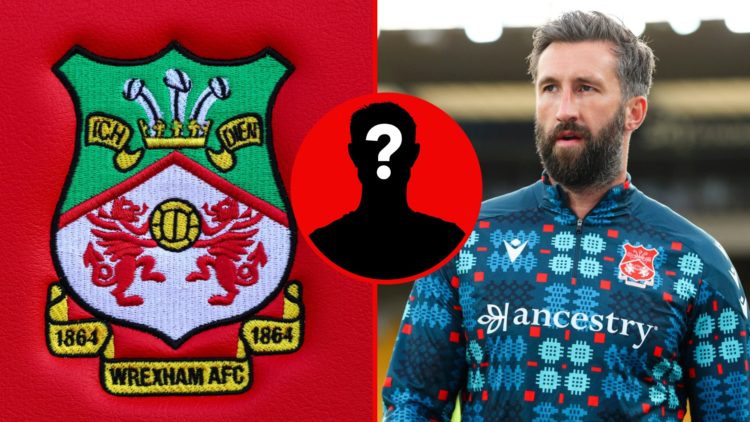 Detailed view of a Wrexham club crest. Ollie Palmer of Wrexham AFC warms up