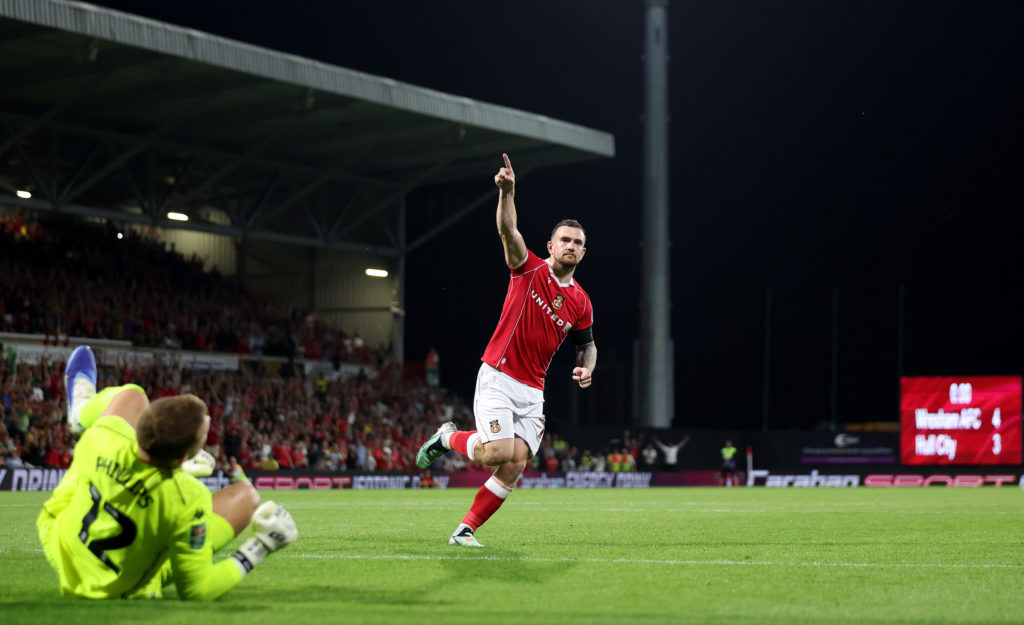 Jack Marriott of Wrexham celebrates victory
