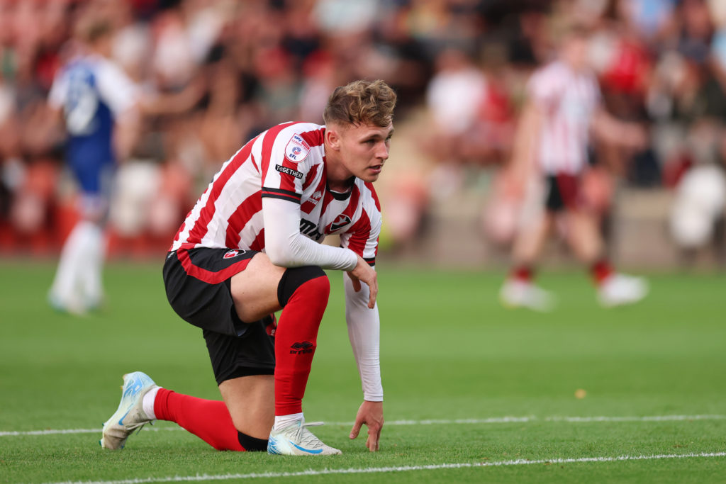 Jake Bickerstaff in action for Cheltenham Town v Exeter City