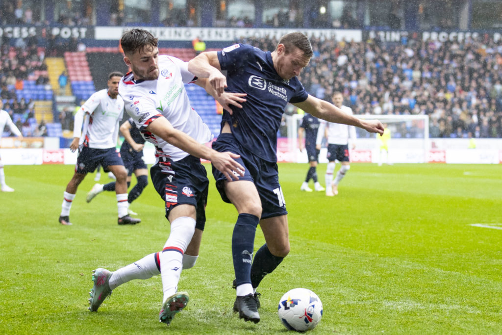 Paul Mullin in action for Wigan Athletic against Bolton Wanderers