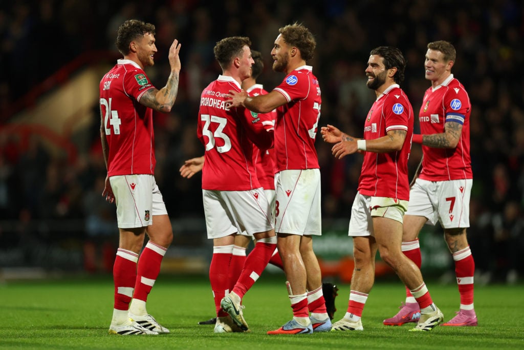Nathan Broadhead of Wrexham celebrates after he scores