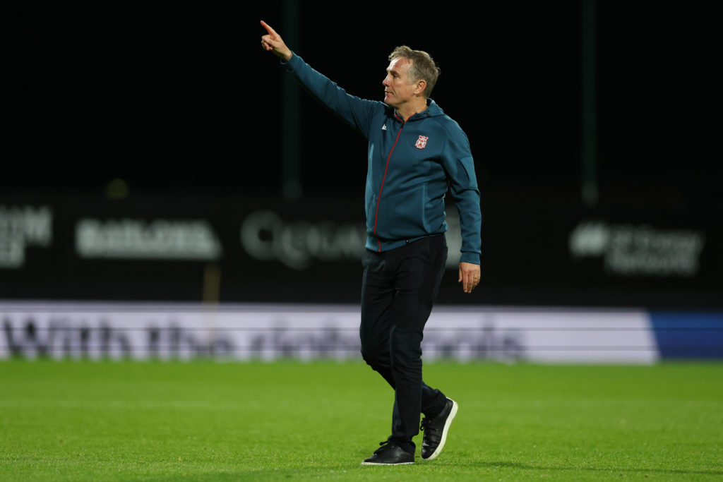 Phil Parkinson gestures to Wrexham fans against Reading