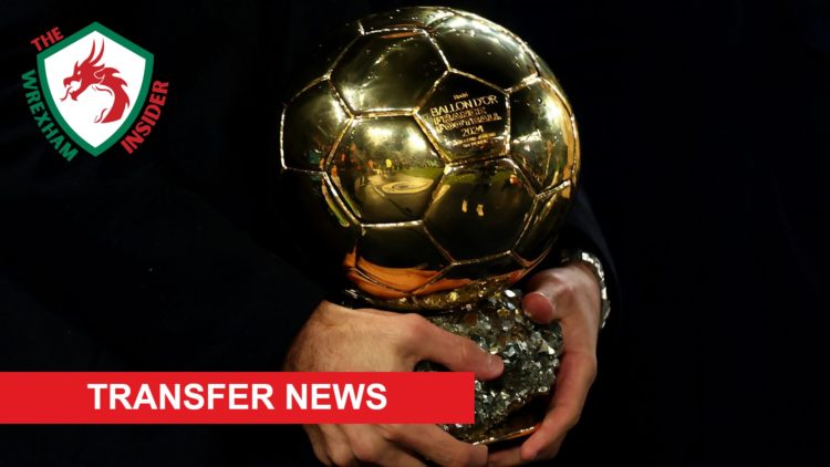 A picture of the Ballon d'Or trophy.