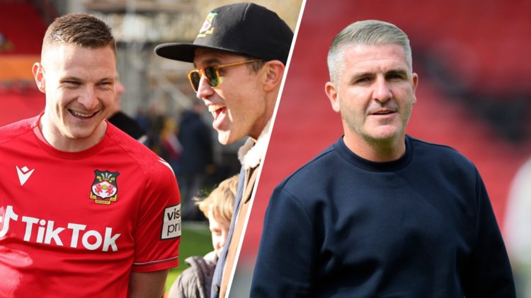 Paul Mullin of Wrexham chats to American actor and co-owner of Wrexham Football Club, Rob McElhenney. Ryan Lowe, head coach of Wigan Athletic.