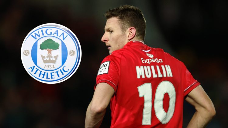 Paul Mullin during Wrexham v Sheffield United: Emirates FA Cup Fourth Round. The club crest of Wigan Athletic is seen outside DW Stadium prior to t...