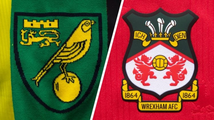 Norwich City badge. The official club badge of Wrexham AFC on a home shirt.