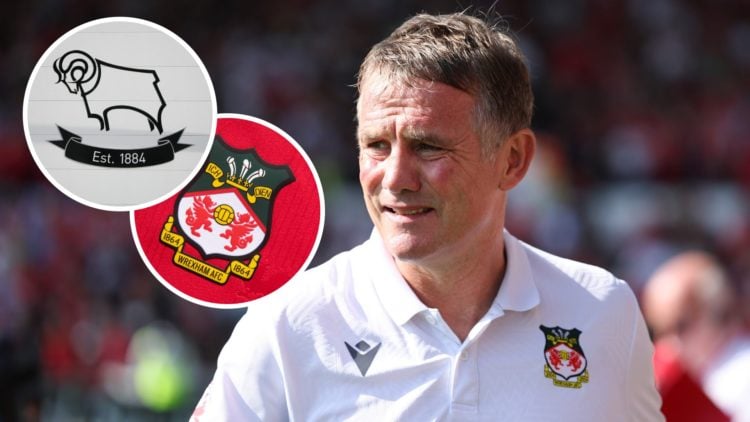 Wrexham boss Phil Parkinson looks on against Doncaster Rovers. Wrexham badge on a red home shirt. Derby County badge.