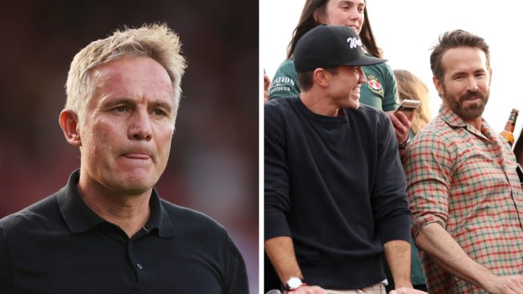 Phil Parkinson, Manager of Wrexham, looks on (left), Rob McElhenney, Co-Owner of Wrexham, and Ryan Reynolds, Co-Owner of Wrexham, look on (right)