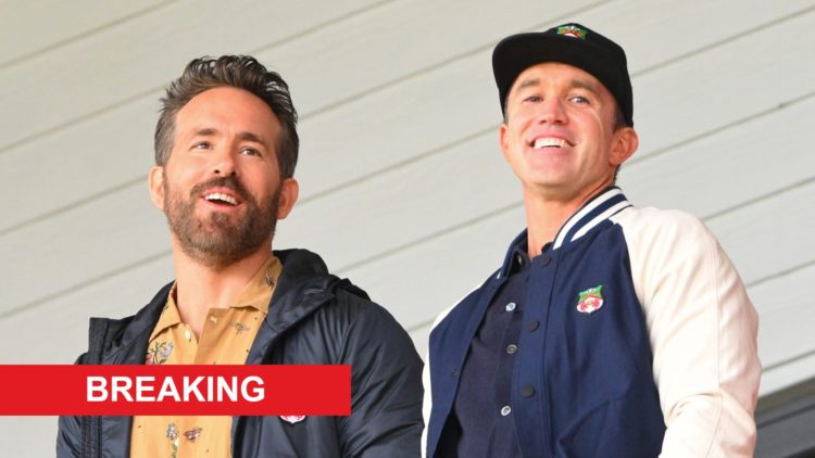Ryan Reynolds and Rob McElhenney look on ahead of Wrexham v Notts County.
