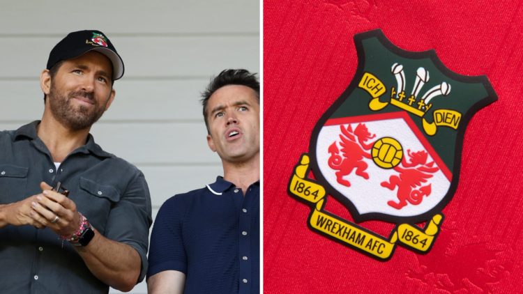 Ryan Reynolds and Rob McElhenney look on before Wrexham's Vanarama National League Play-Off Semi-Final match against Grimsby Town. Wrexham badge on...