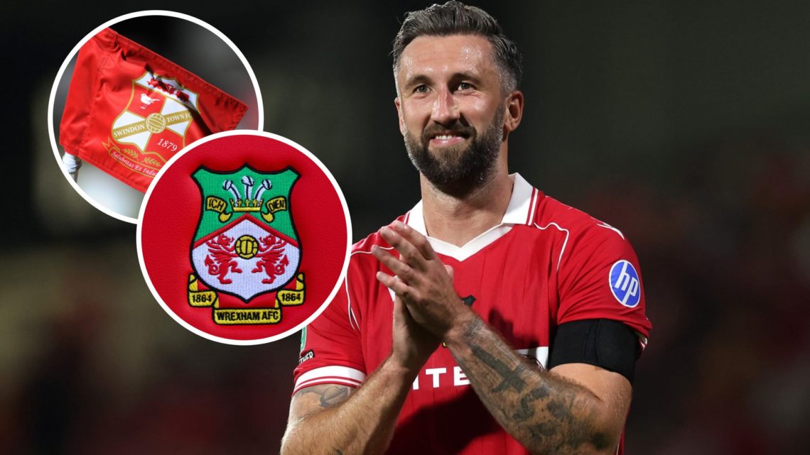 Ollie Palmer of Wrexham applauds the fans. Wrexham club crest. A Swindon Town corner flag prior to Swindon Town v Accrington Stanley - Sky Bet Leag...