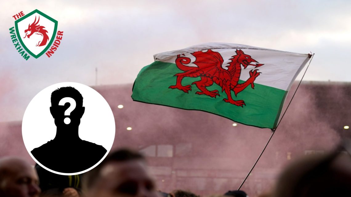 The Wales flag being flown at a Wales football match. Inset a picture of a mystery player.
