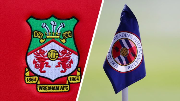 Detailed view of a Wrexham club crest. A corner flag with the logo of the Reading Football Club