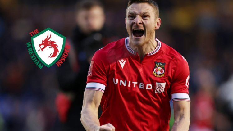 Wrexham player Paul Mullin celebrates.