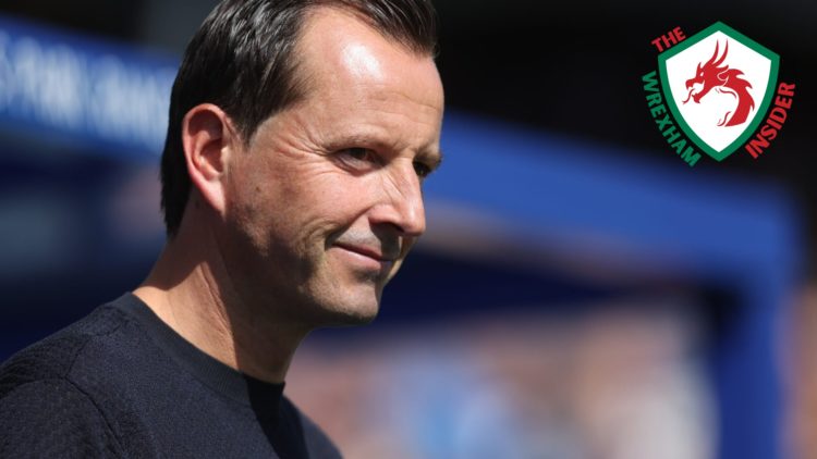 QPR manager Julien Stephan stands on the sidelines.
