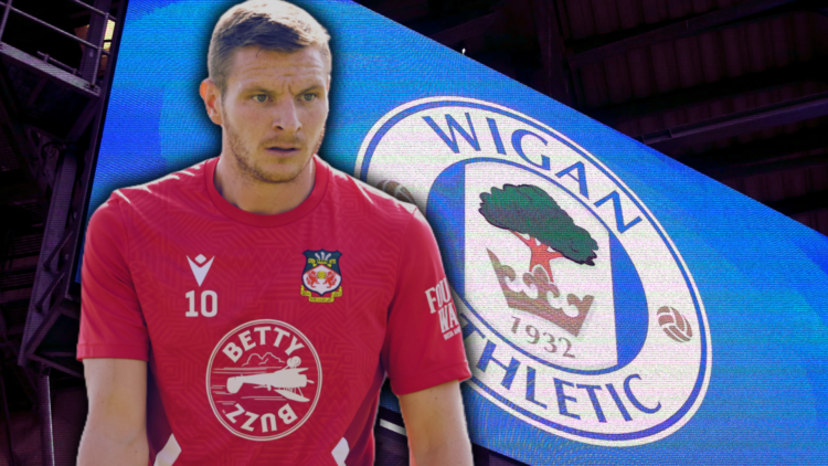 The club crest of Wigan Athletic is seen on a big screen inside DW Stadium. Paul Mullin prior to Wrexham v Doncaster Rovers - Sky Bet League Two