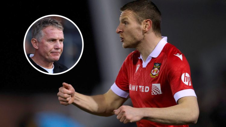 Paul Mullin during Shrewsbury Town FC v Wrexham AFC - Sky Bet League One. Phil Parkinson, Manager of Wrexham looks on.