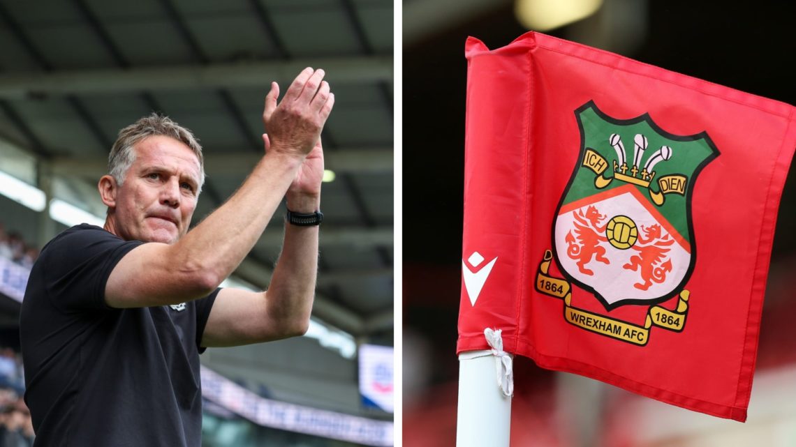 Wrexham manager Phil Parkinson applauds the fans. A detailed view of a Wrexham corner flag is seen during the Vanarama National League match betwee...