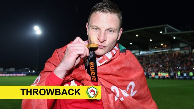 former Wrexham striker Paul Mullin with throwback banner overlaid.