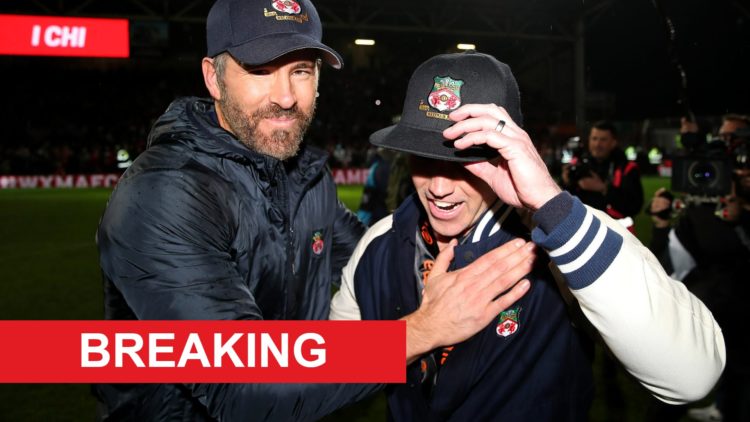 Wrexham co-owners Ryan Reynolds and Rob Mac celebrate promotion.